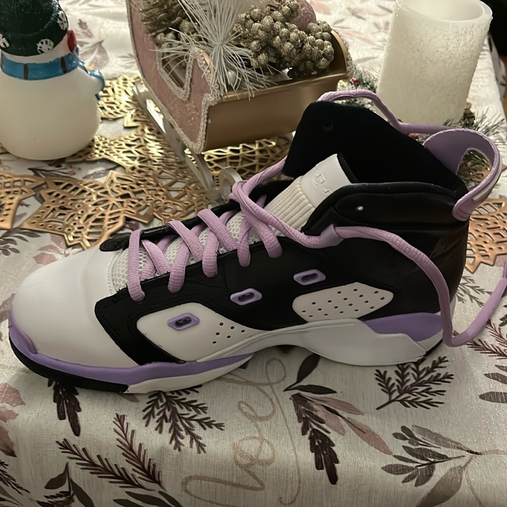 Jordans size 7 colors white black and purple wore a few times in good condition